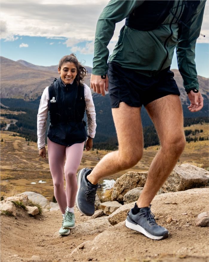Two people walking outdoors